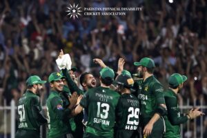 Pakistan Cricket Team players celebrating a victory on the field